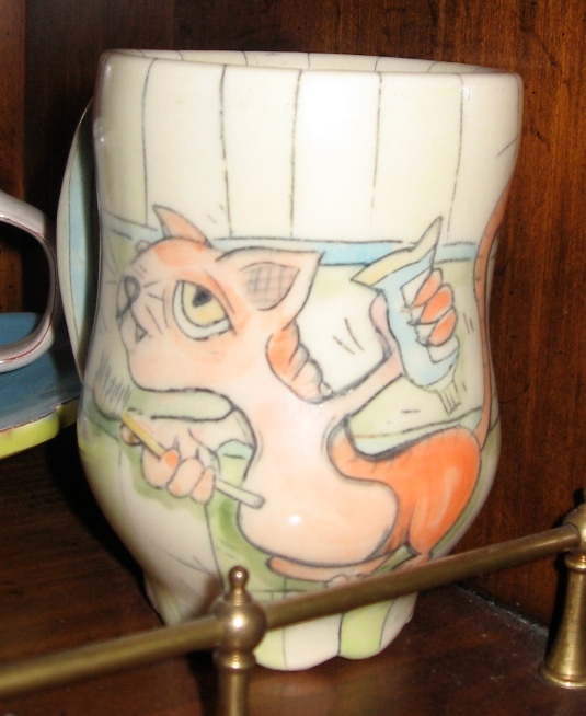 Freshen Up cat mug by Chandra DeBuse.